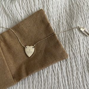 Authentic Gucci sterling silver engraved heart bracelet